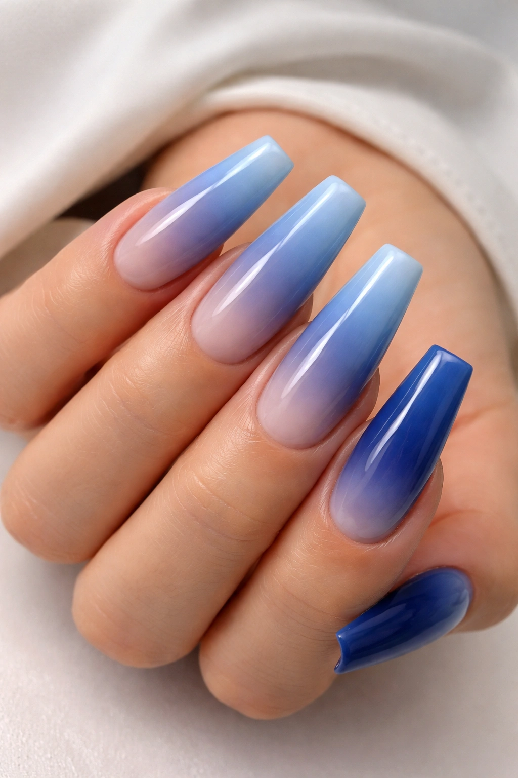Ombre blue acrylic nails with smooth gradient