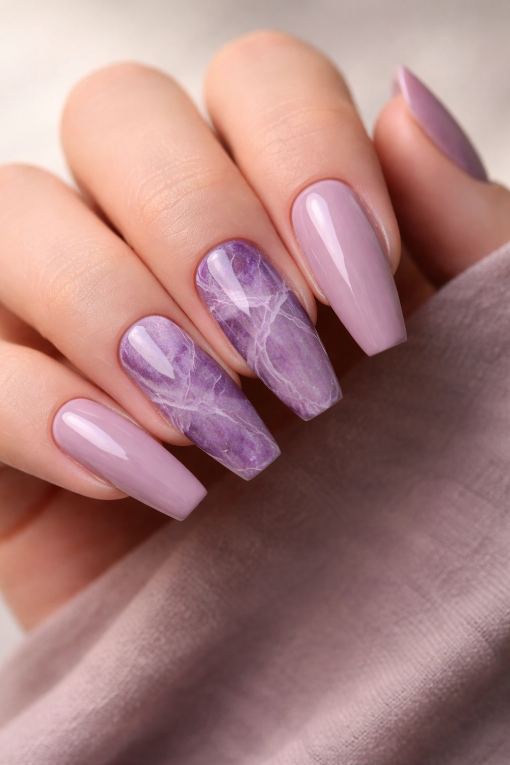 Amethyst marble nails with white veining on ballerina nails