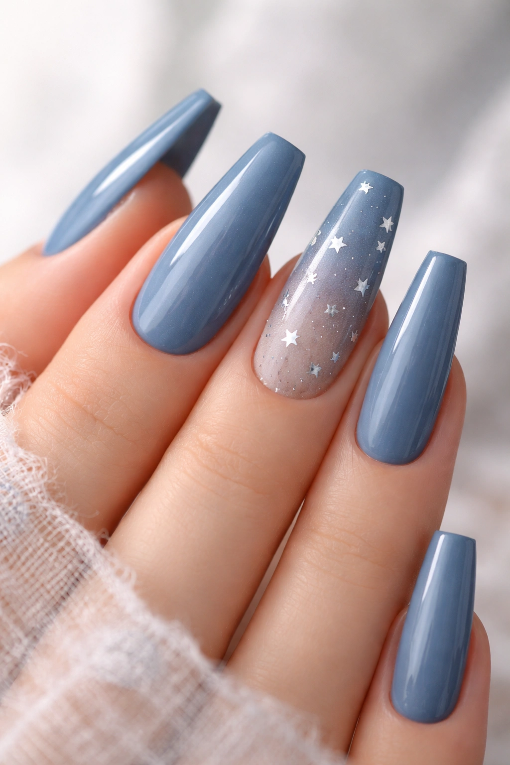 Denim blue ballerina nails with tiny silver star accents on accent nails
