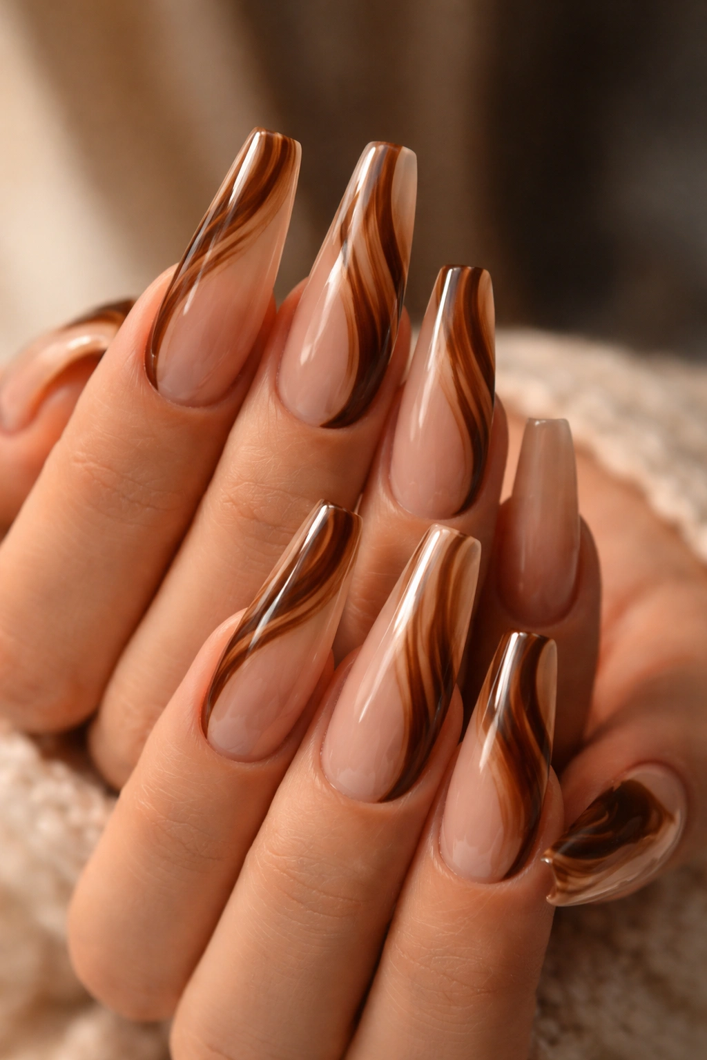 Espresso and caramel swirl jelly finish on long ballerina nails
