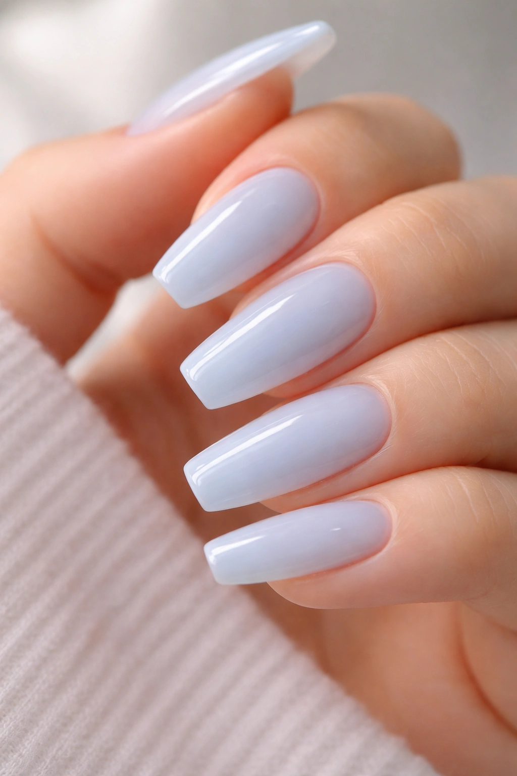 Milky blue glass nails on ballerina shape with glassy topcoat