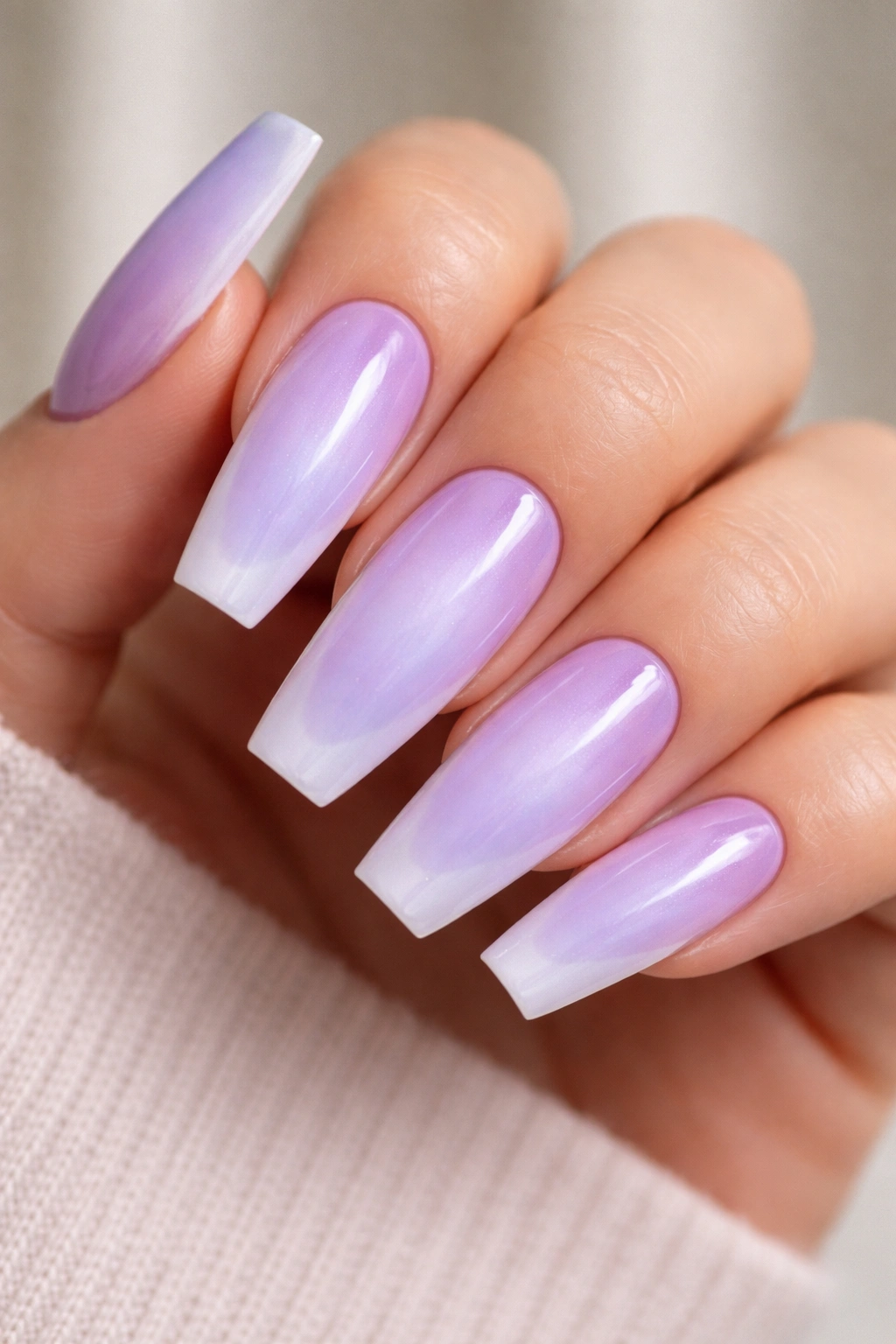 Periwinkle lilac aura nails with hazy center glow on ballerina shape