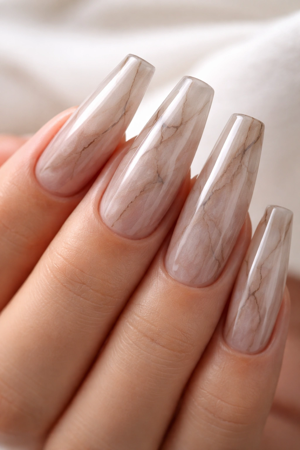 Long ballerina nails with smoky quartz marble and subtle veining