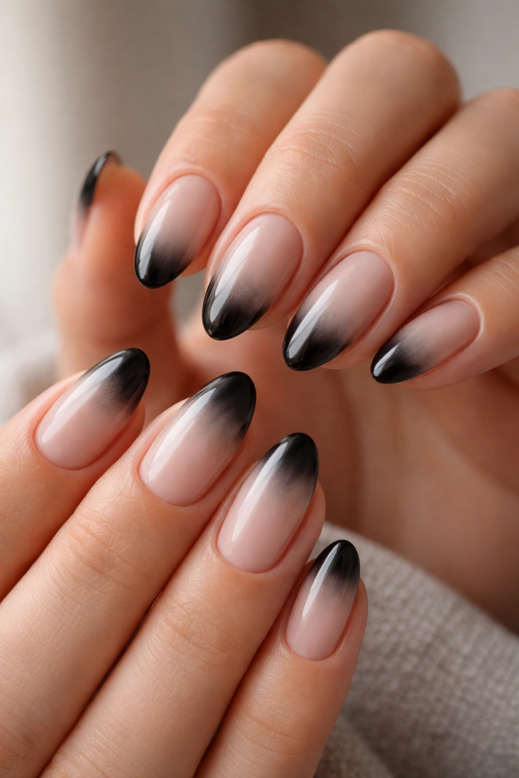 Almond nails with white-to-black gradient tips