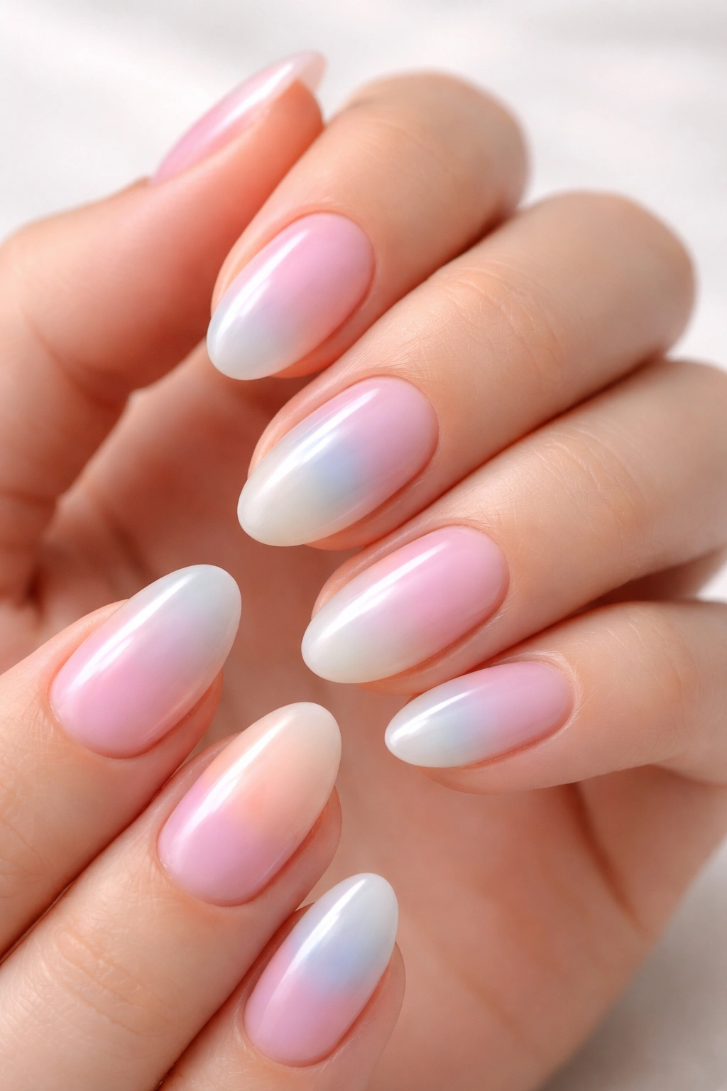 Aura gradient on short almond nails with feathered edge diffusion