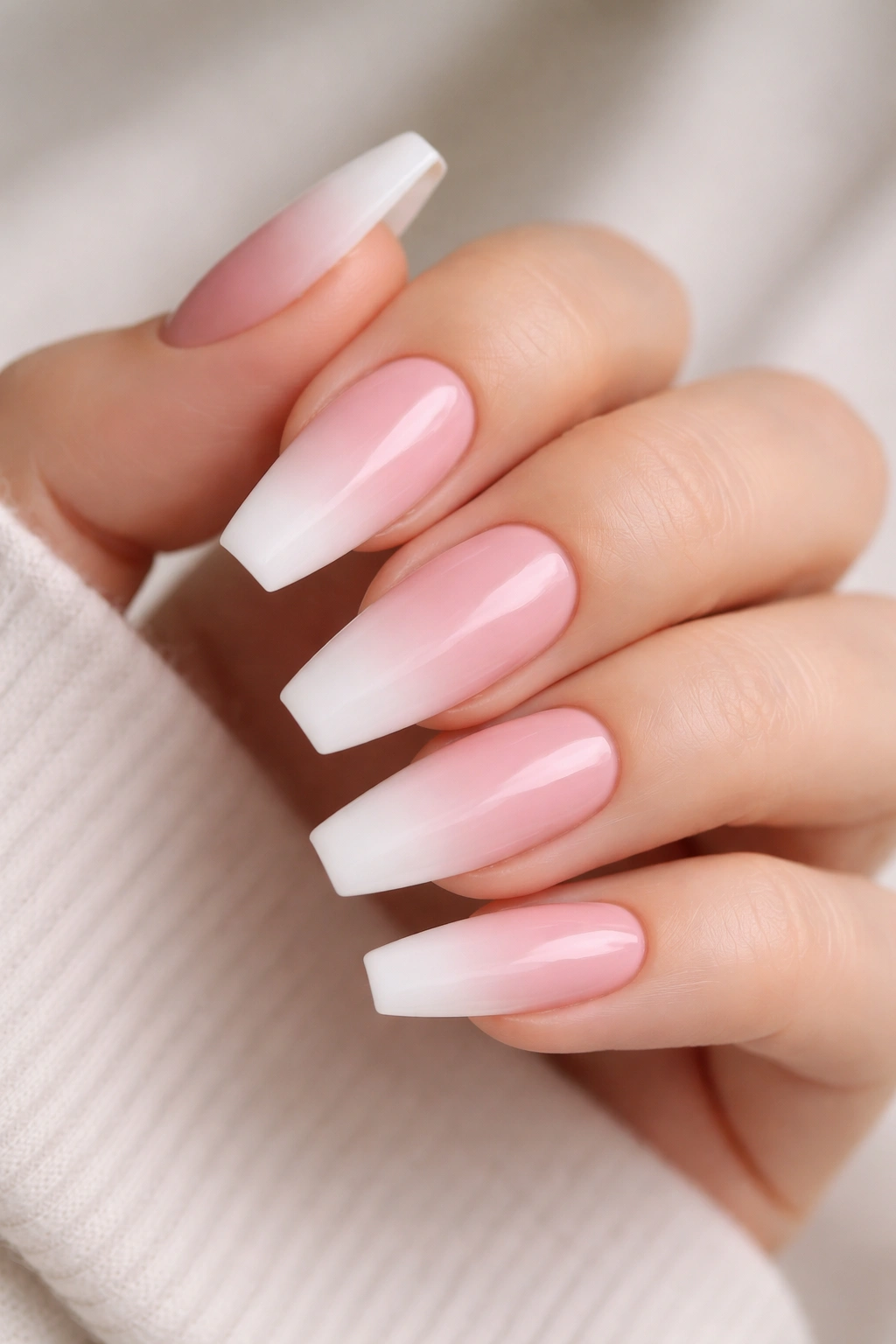 Pink and white ballerina nails with a soft baby boomer fade