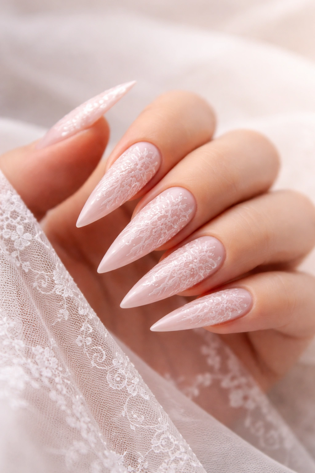 Ballet pink stiletto nails with lace overlay
