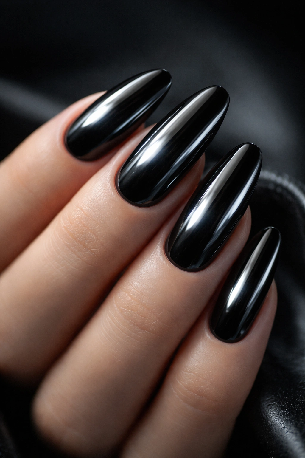 Black chrome nails with glossy mirror finish