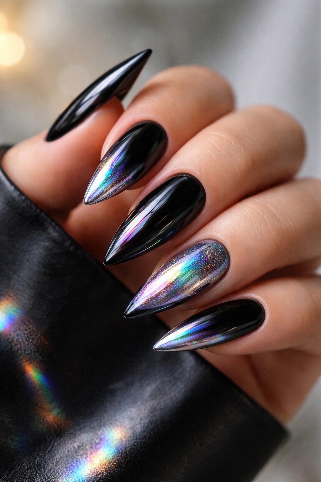 Black stilettos with holographic chrome accents reflecting light
