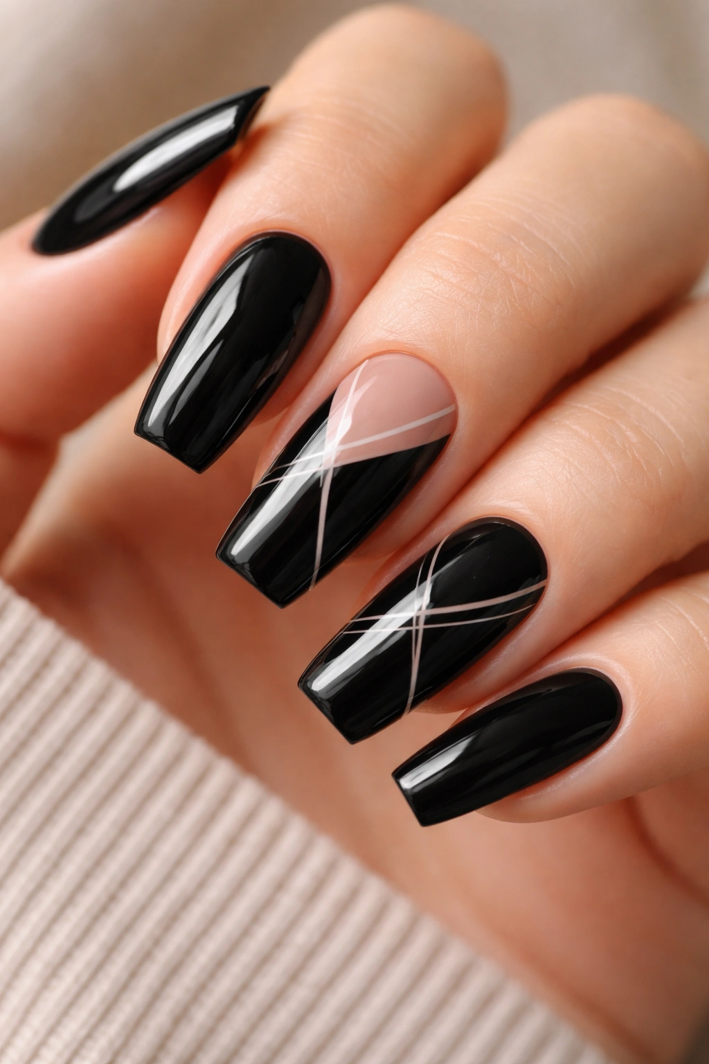 Black coffin nails with negative-space line art