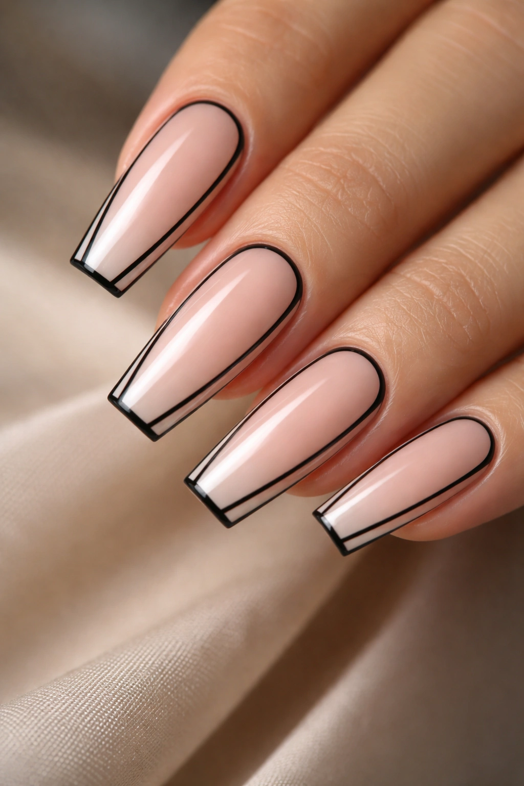 Coffin nails with slim black outline around negative space