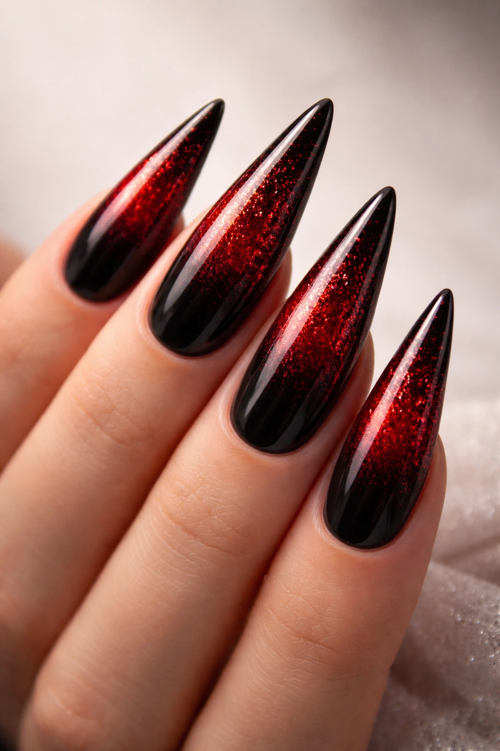 Black to red ombre nails with glitter gradient