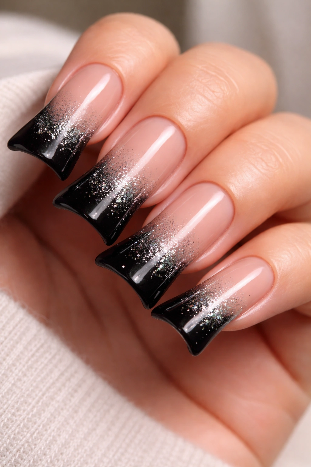 Duck nails with black tips and glitter gradient on nude base