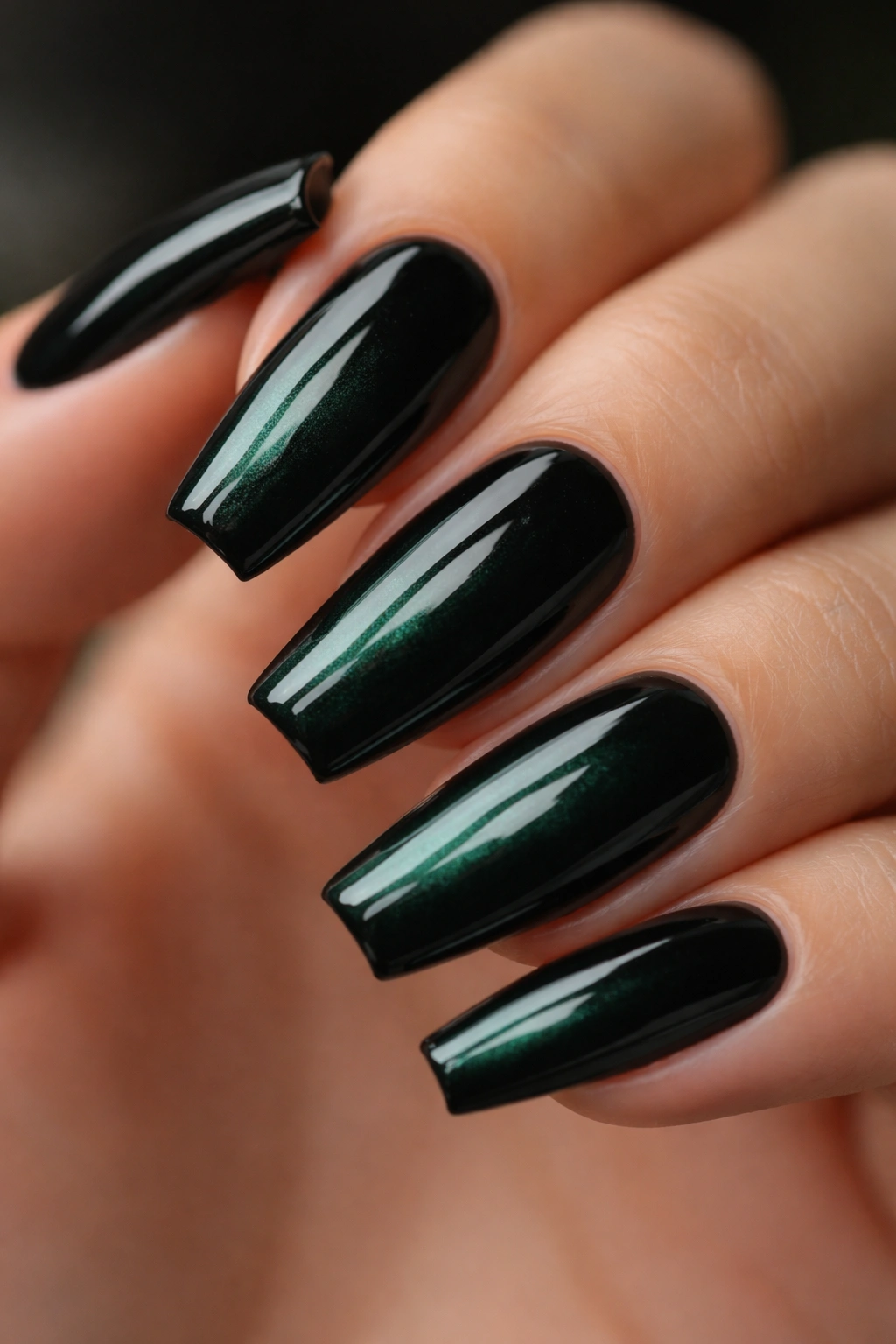 Blackened emerald nail with wet-look gloss