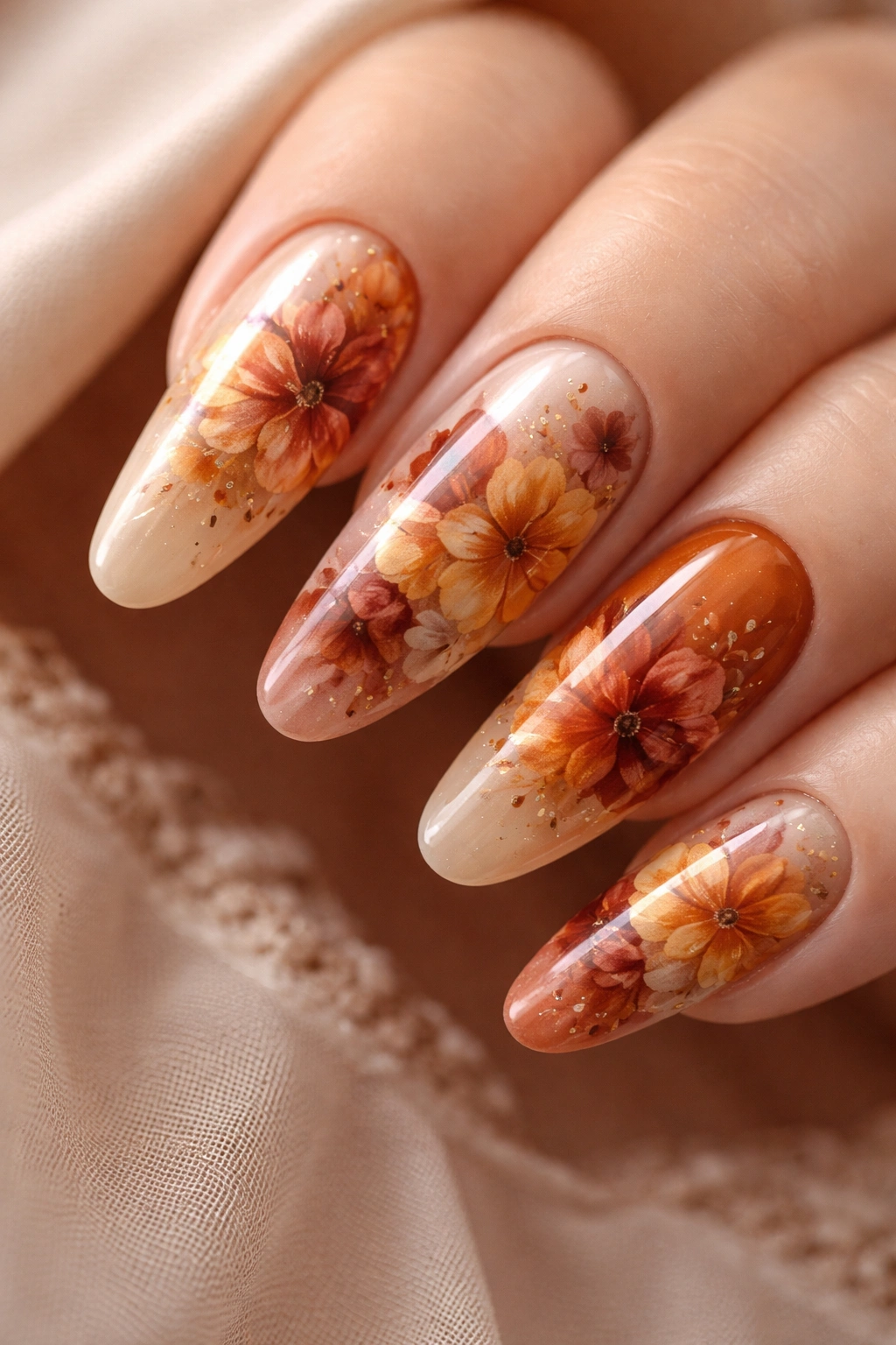 Close-up of blooming gel floral nails with watercolor patterns
