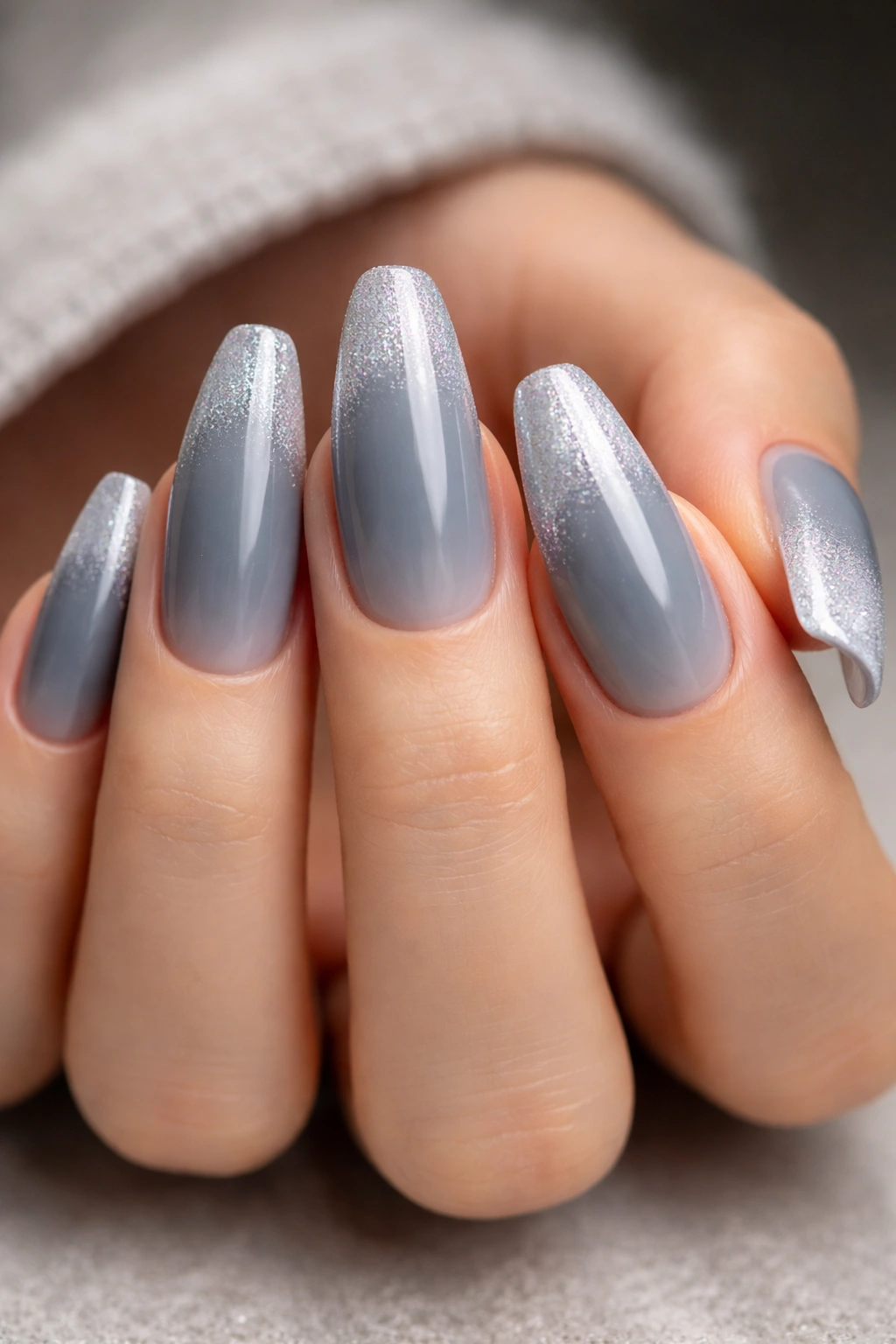 Blue-gray to icy silver ombre on long ballerina nails