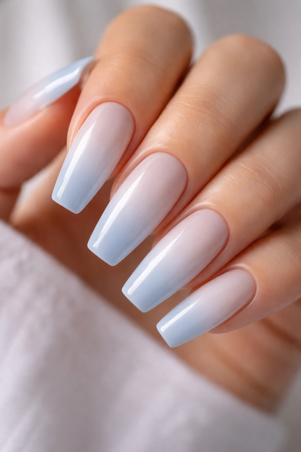 Blue-white ombré porcelain nails on ballerina shape
