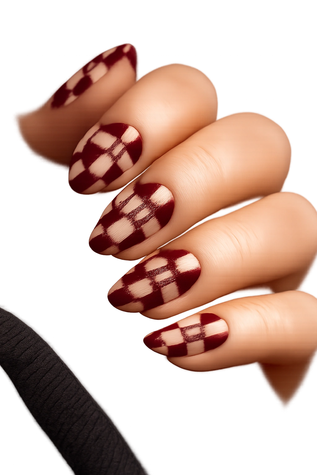 Close-up of short burgundy-check nails with negative space