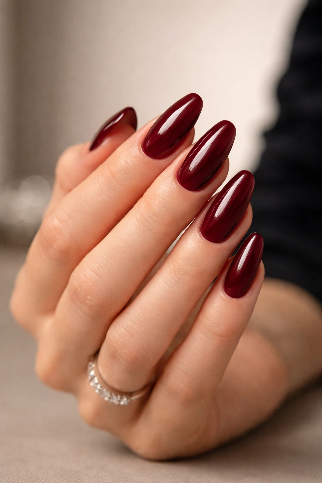 Burgundy formal nails on hand for formal occasion wear