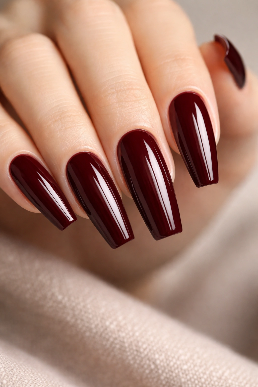 Coffin nails in deep burgundy with glossy finish