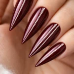 12 Burgundy Stiletto Nails With Rhinestones