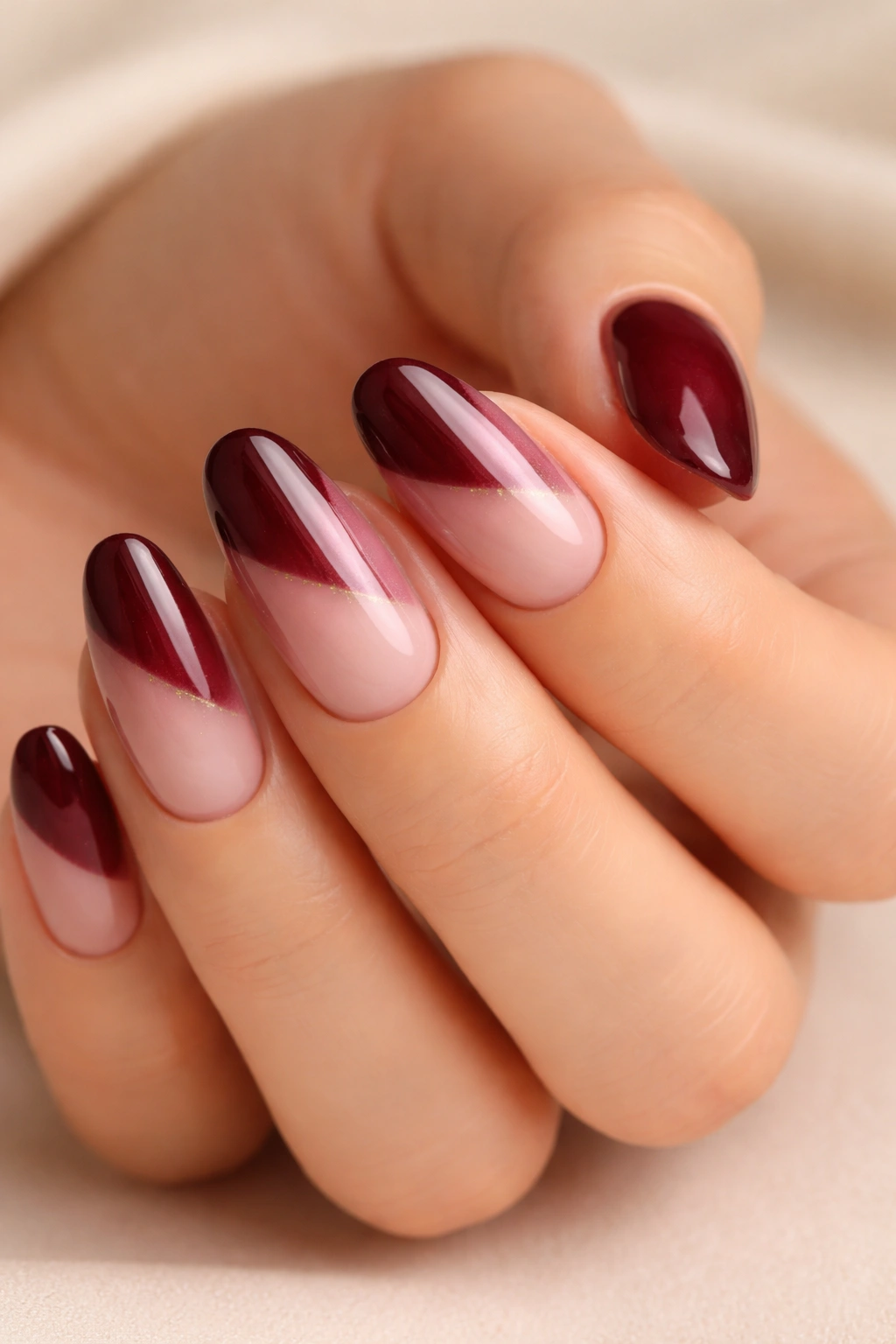 Burgundy and nude blend nails with balanced division