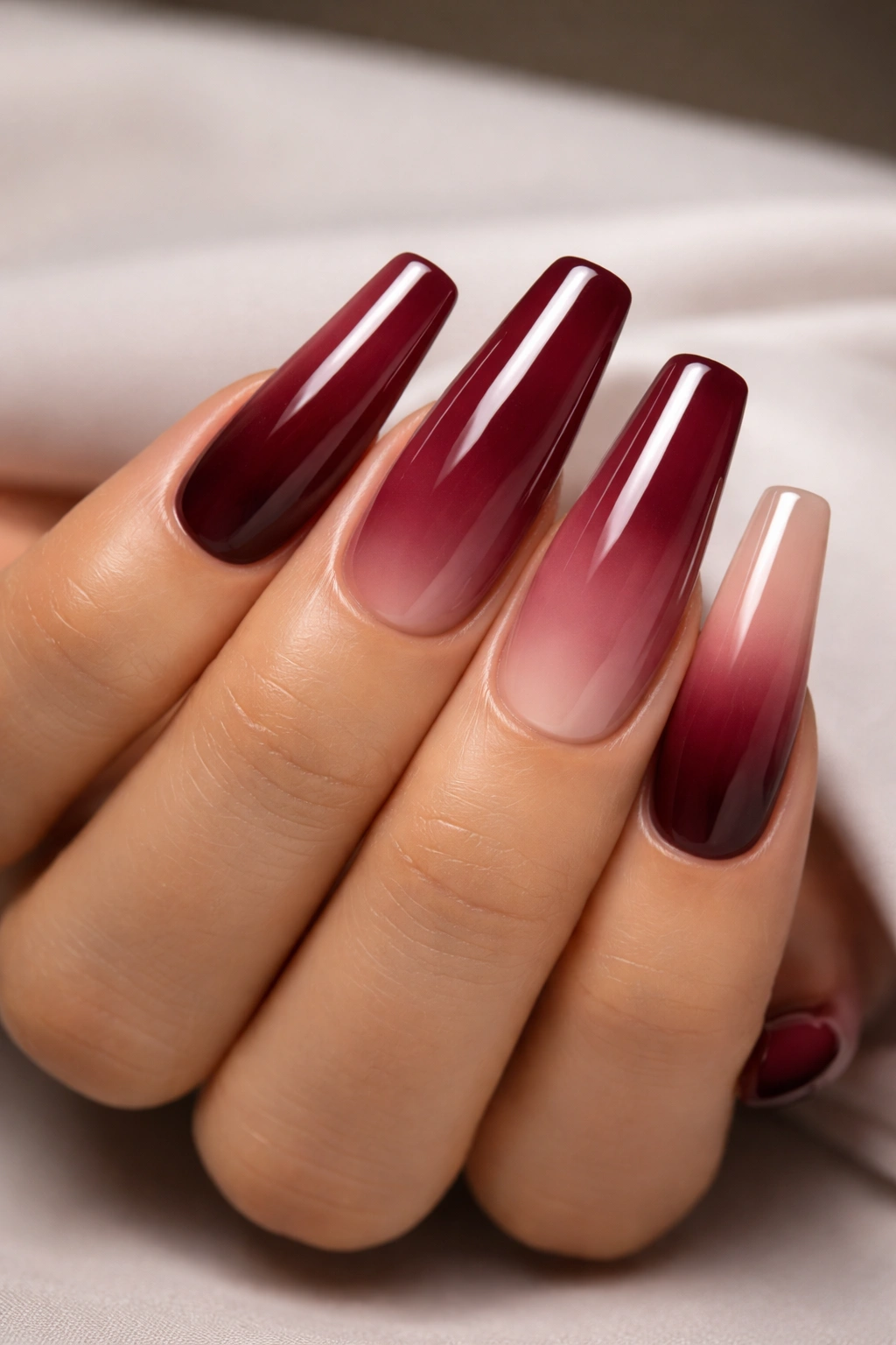 Coffin nails in burgundy-to-nude ombre with glossy finish
