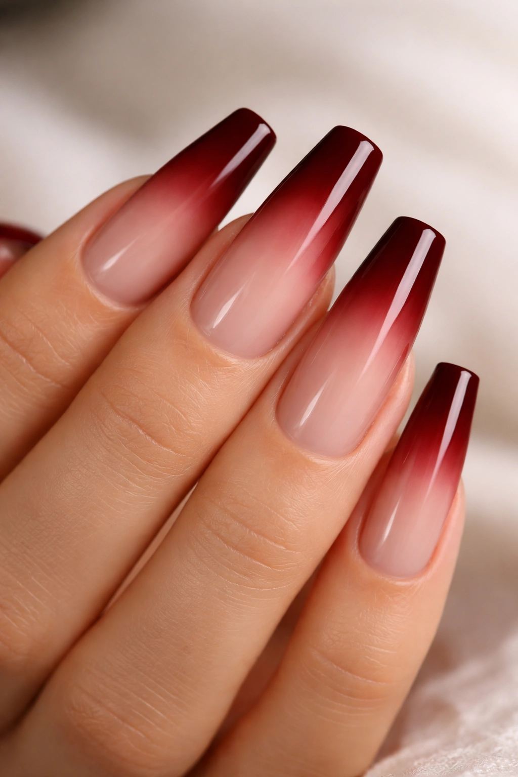 Coffin nails burgundy tip fade to nude and clear