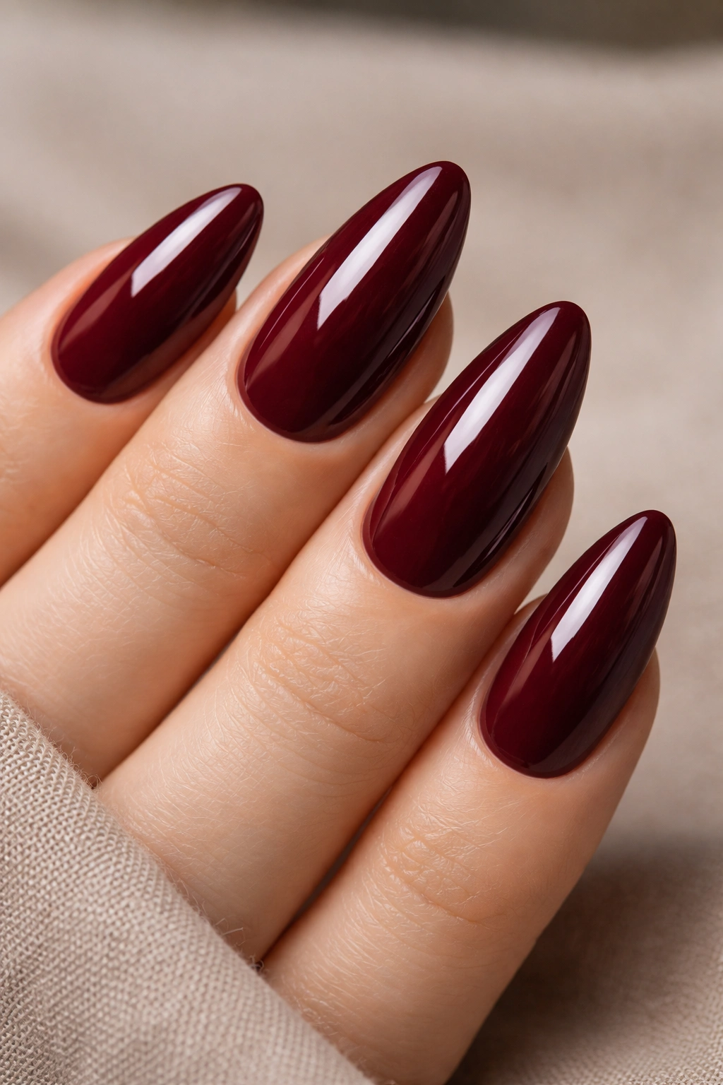 Almond nails burgundy wine color with high gloss