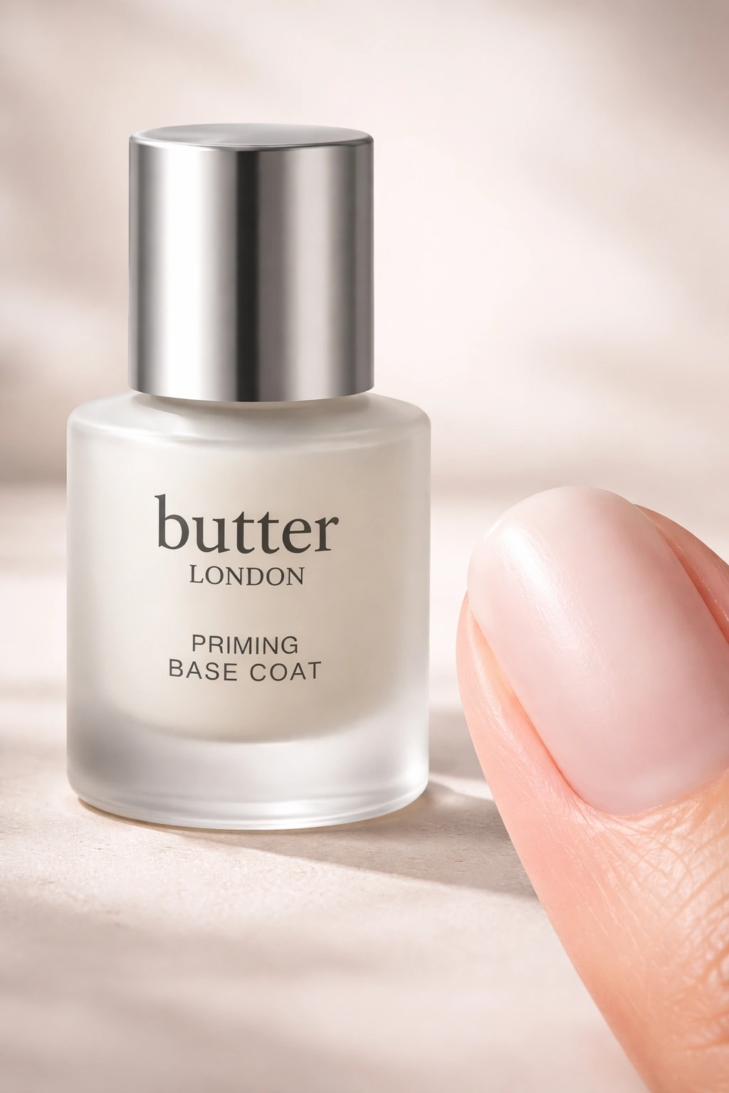 Unmarked matte bottle beside matte-finish nail