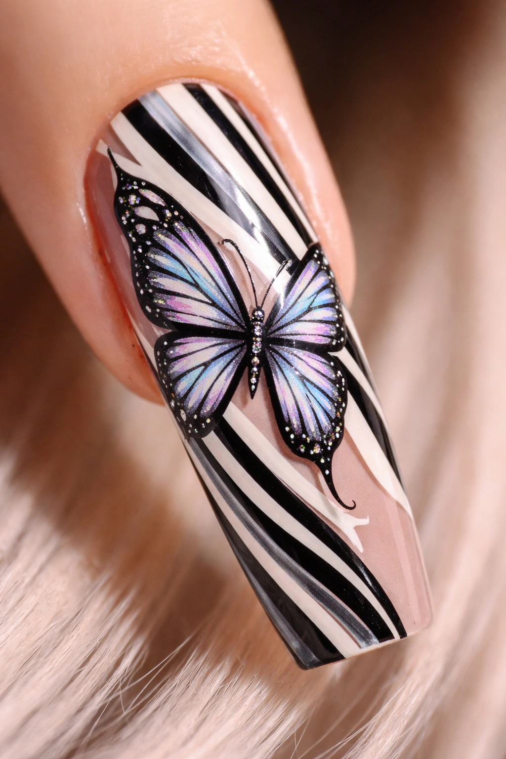 Butterfly with stripe accents on coffin nails