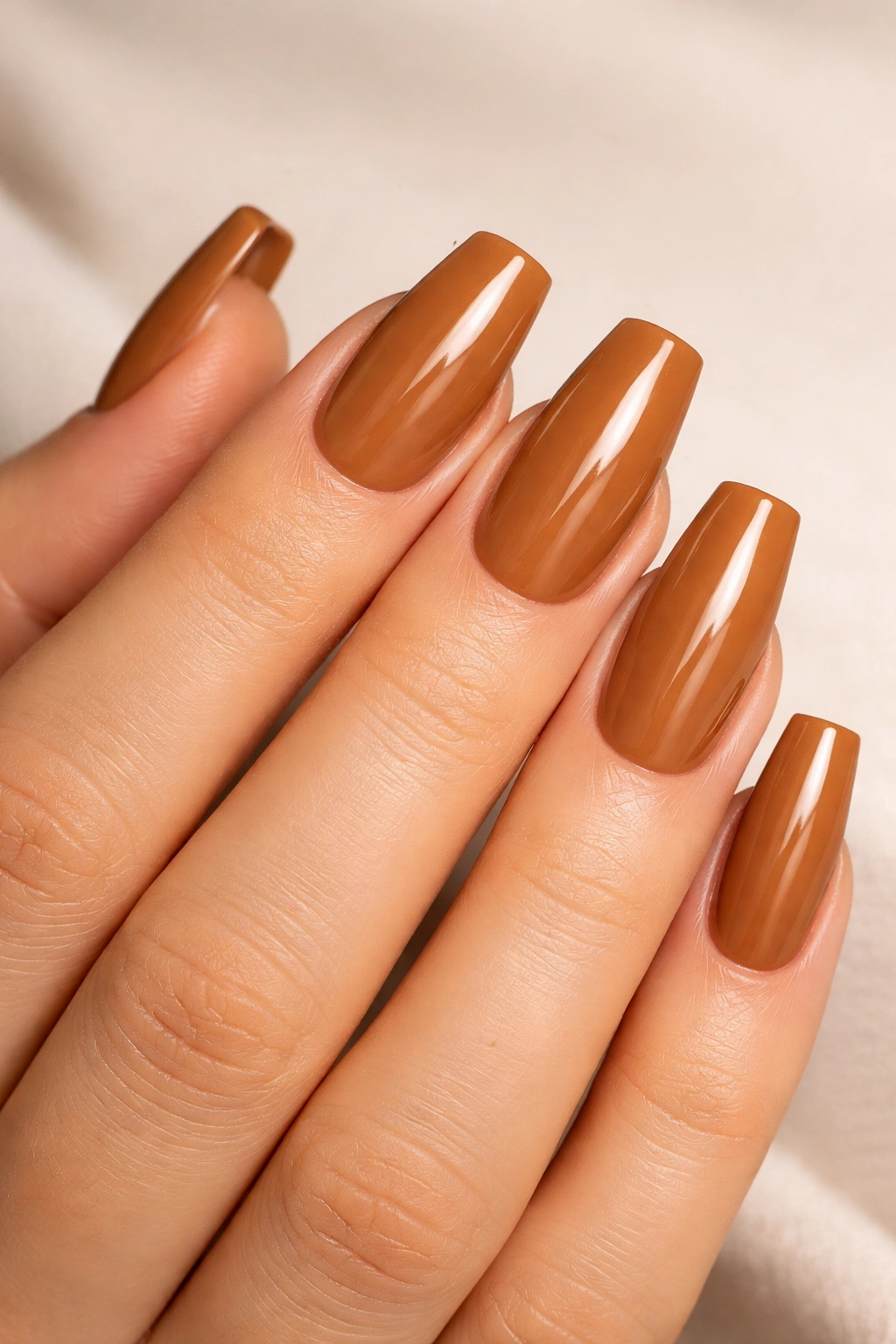 Caramel coffin nails with glossy gel shine