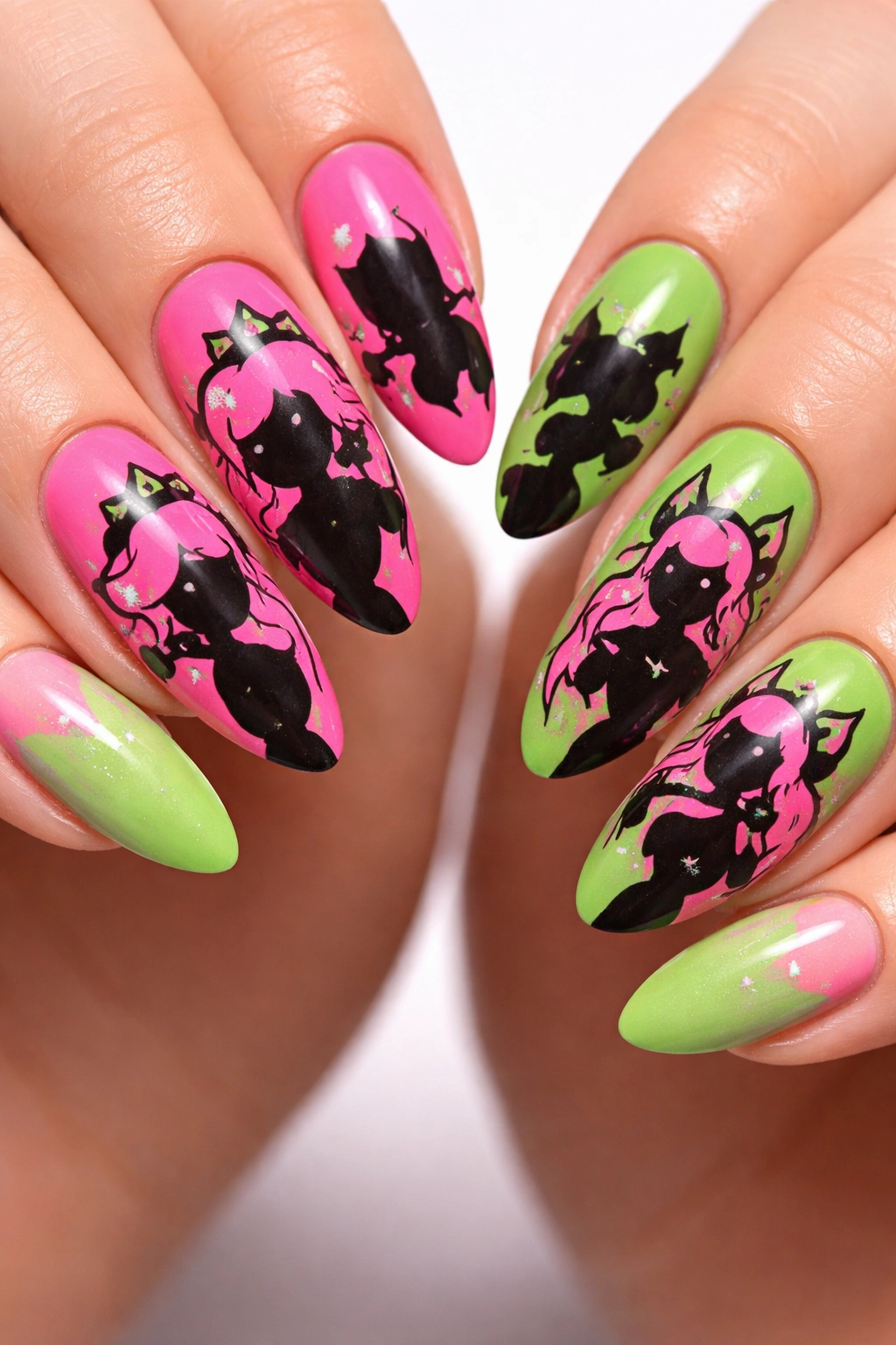Almond nails with stylized cartoon silhouettes in bright colors