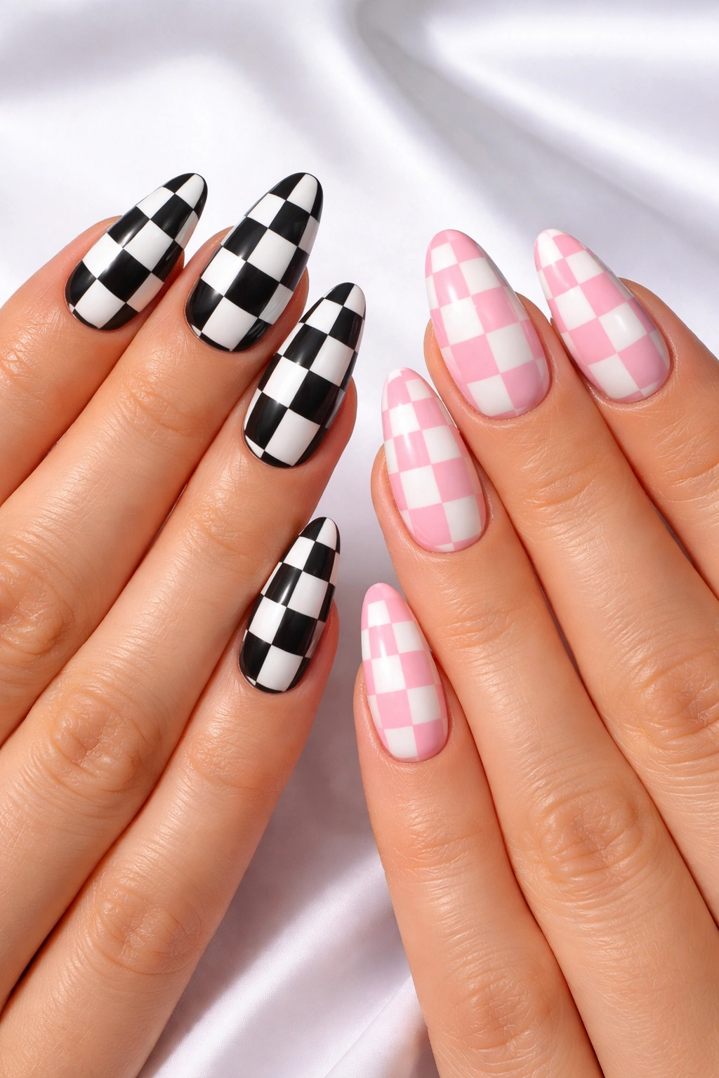 Almond nails with black/white and pink/white checkerboard patterns