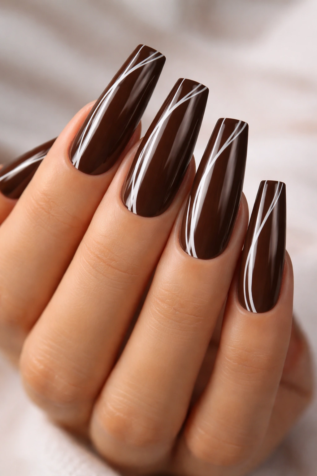 Coffin nails in chocolate brown with white fine lines