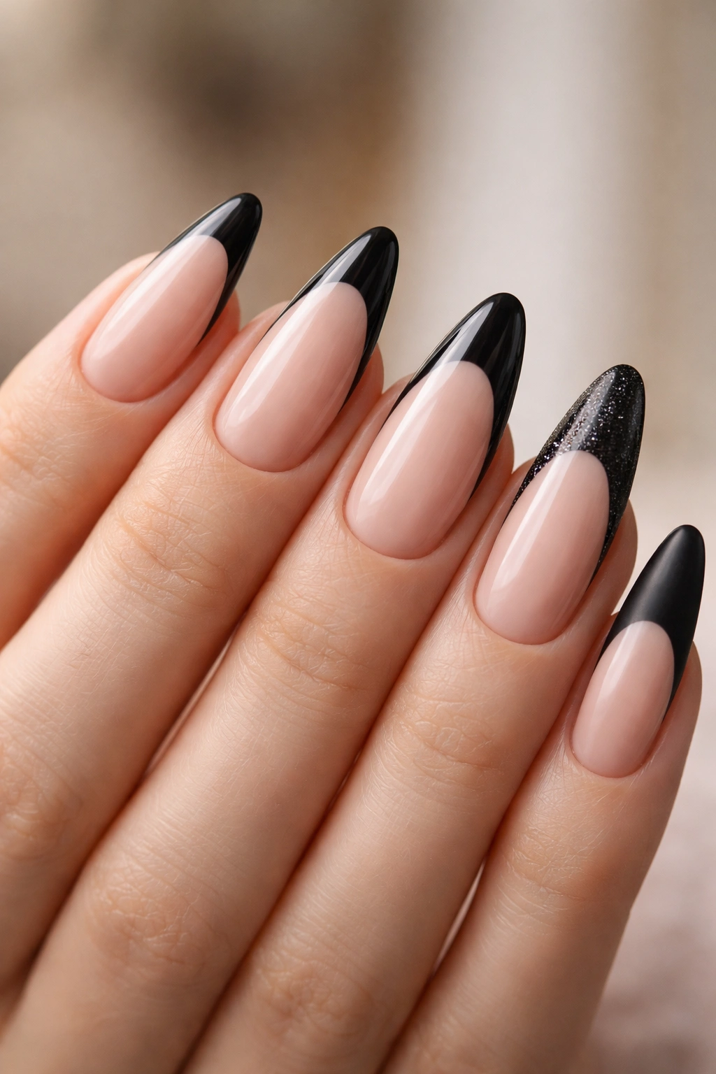 Nails showing different black French tip thickness and finishes for choosing look