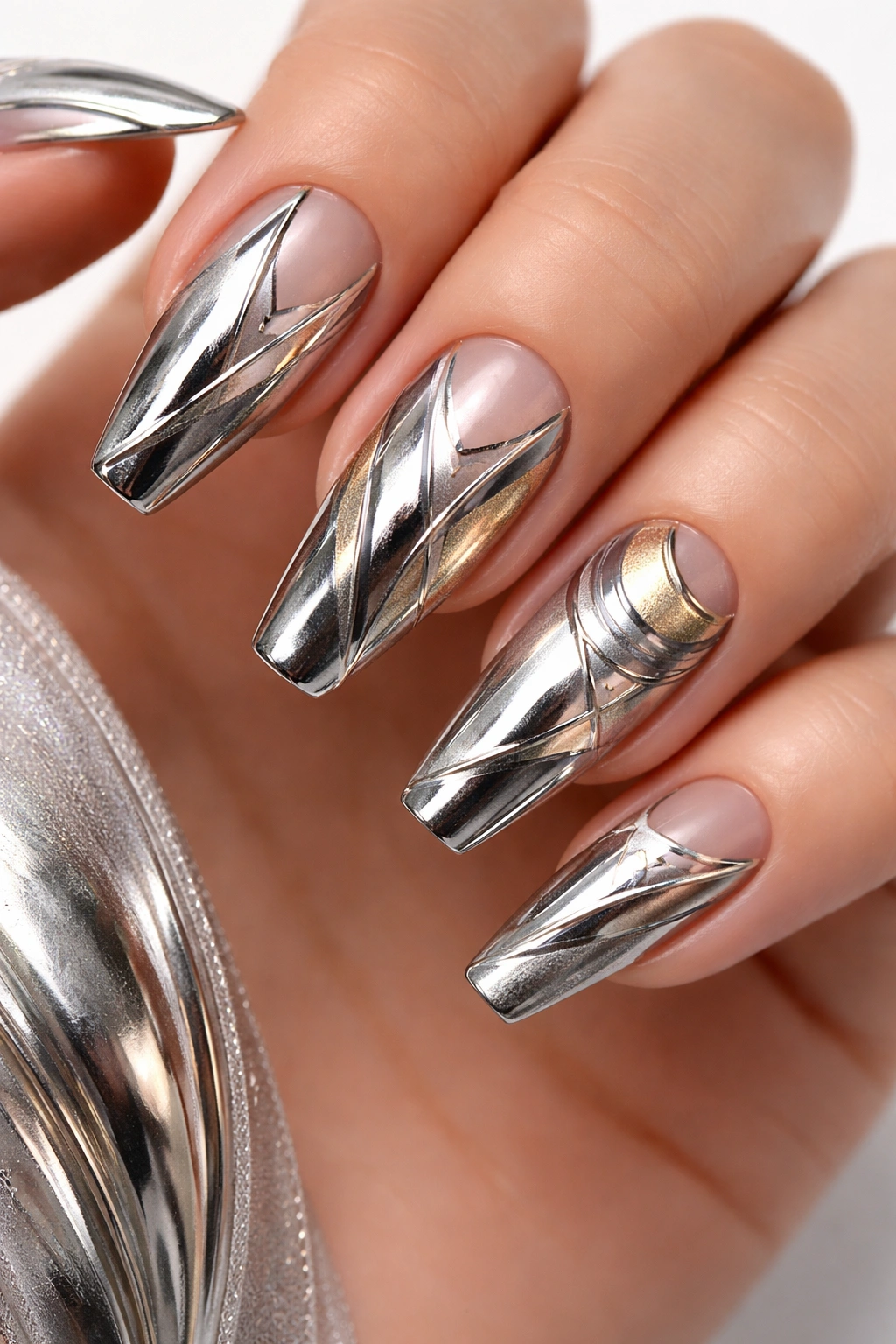 Close-up of chrome and metallic nails with mixed finishes