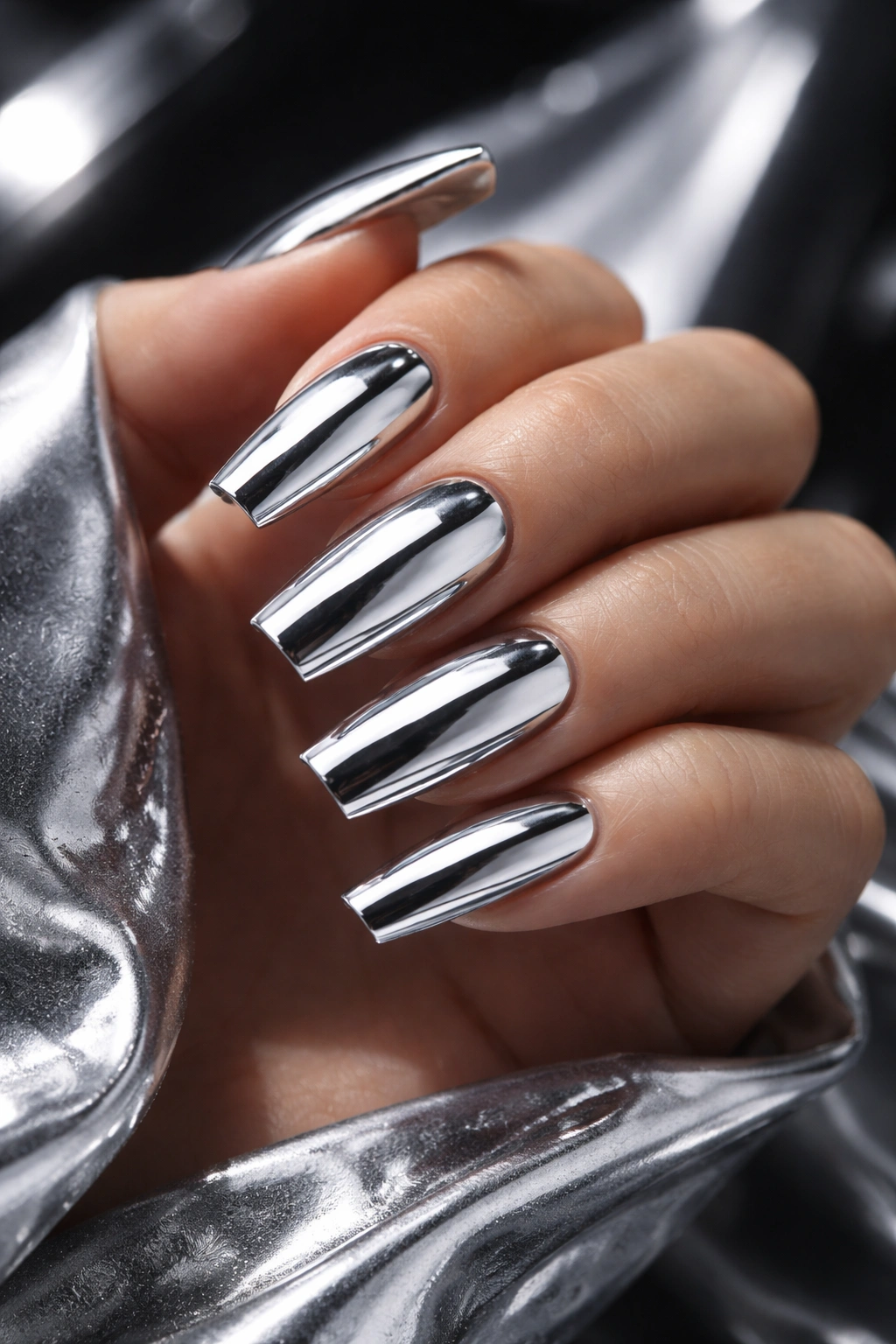 Chrome mirror finish coffin nails reflecting surrounding light