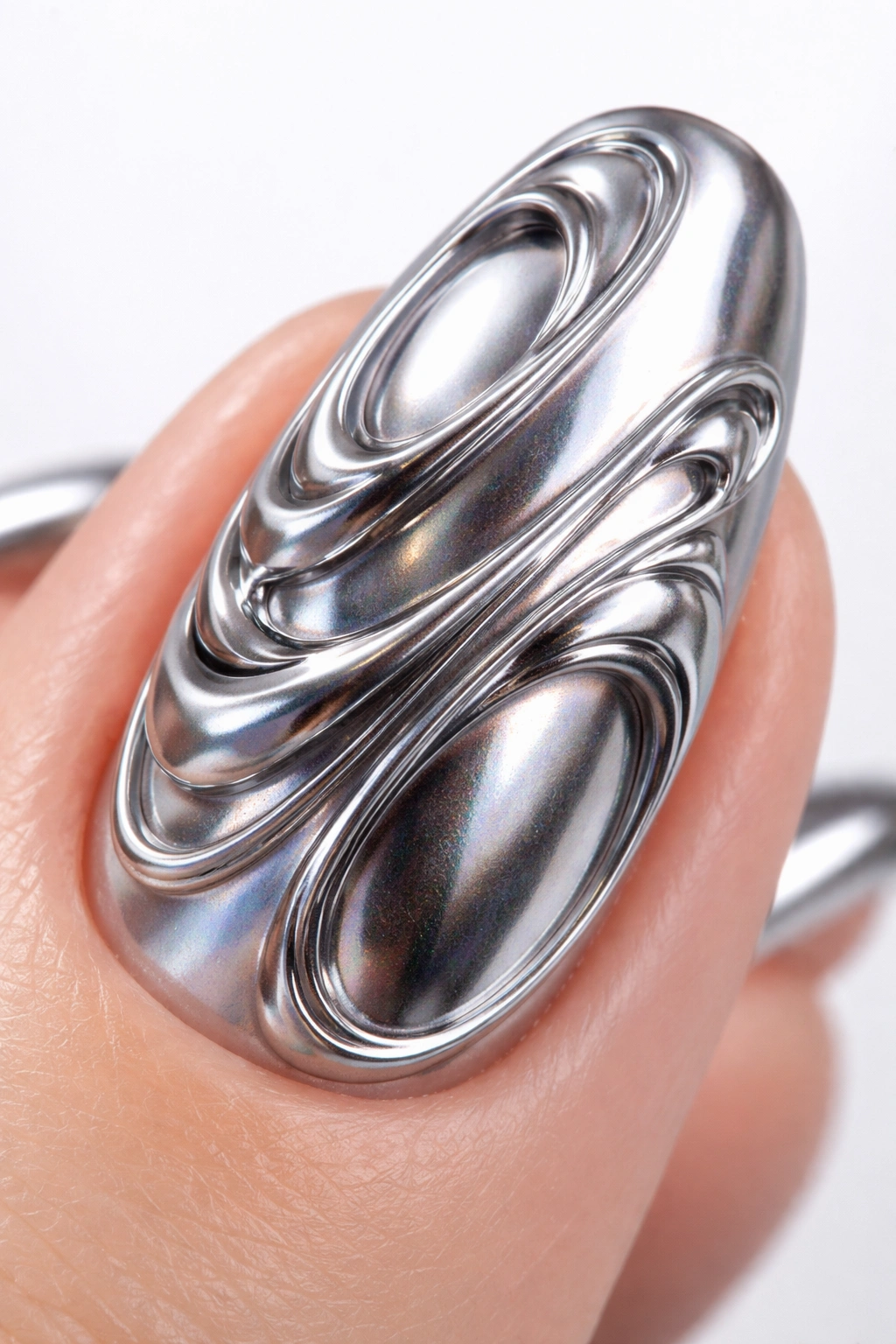 Nail with raised 3D swirls and chrome metallic finish