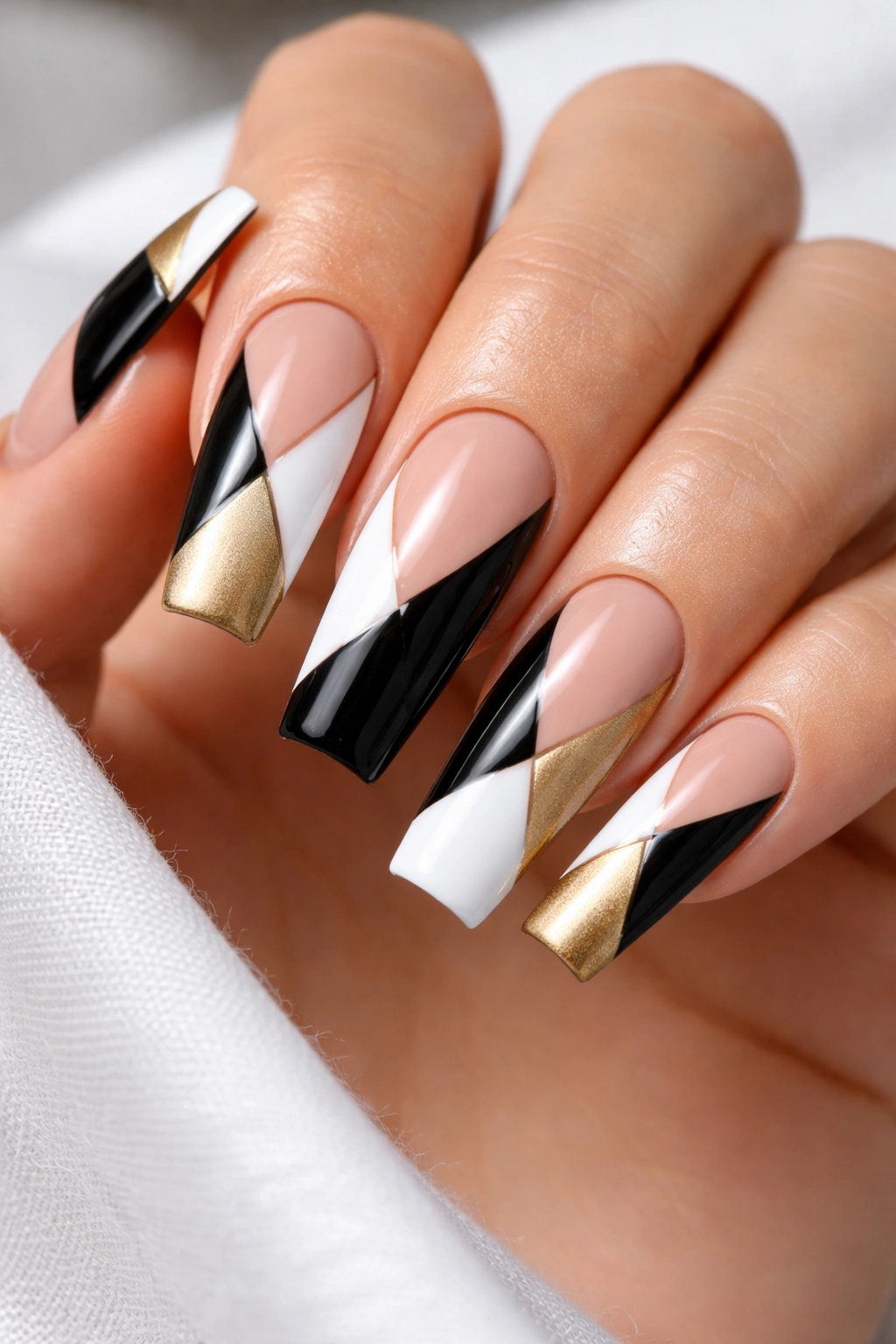 Coffin nails with bold color-block geometric shapes