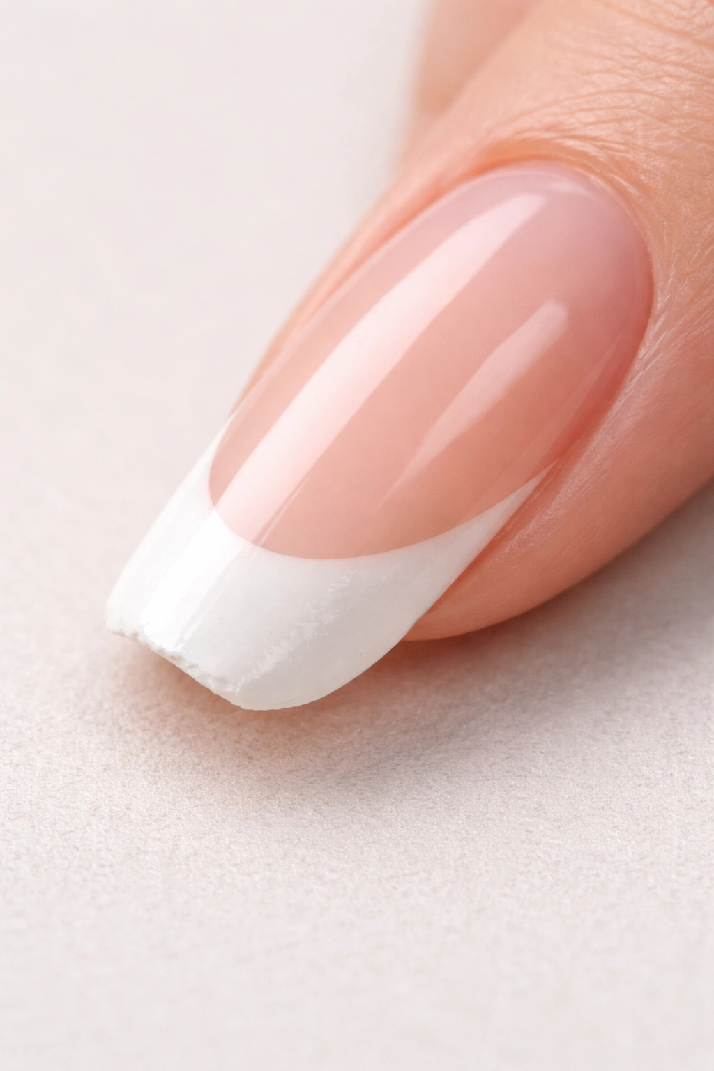 Nail with thick white tip and uneven edge