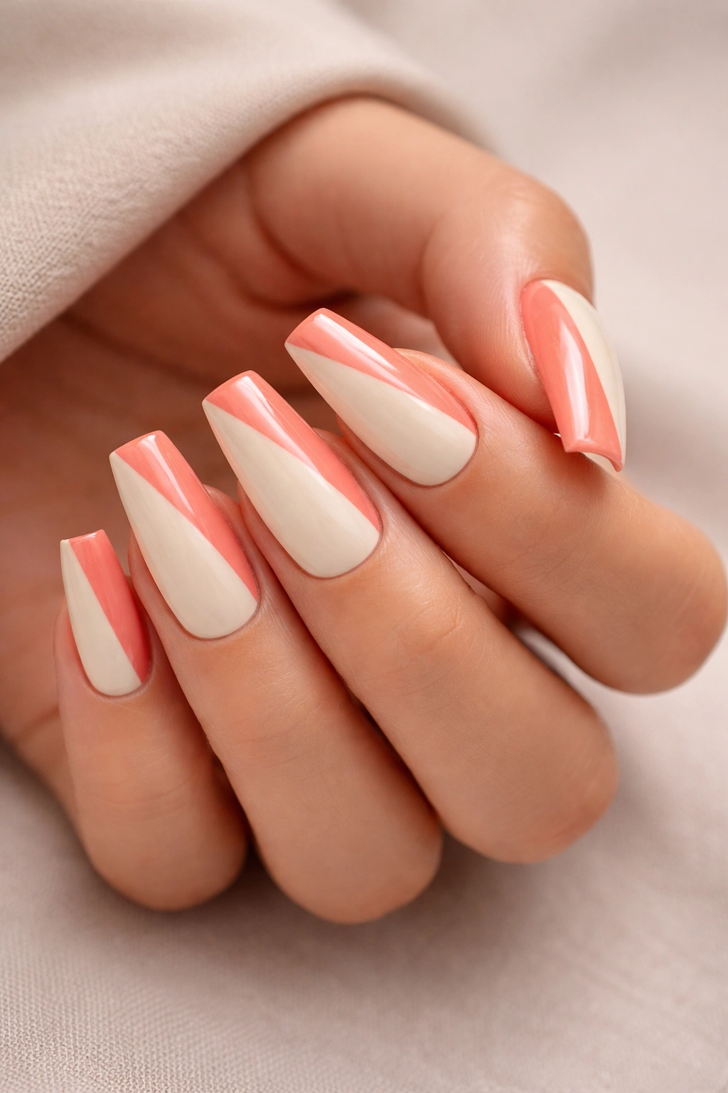 Coffin nails with color-blocked cream and coral segments