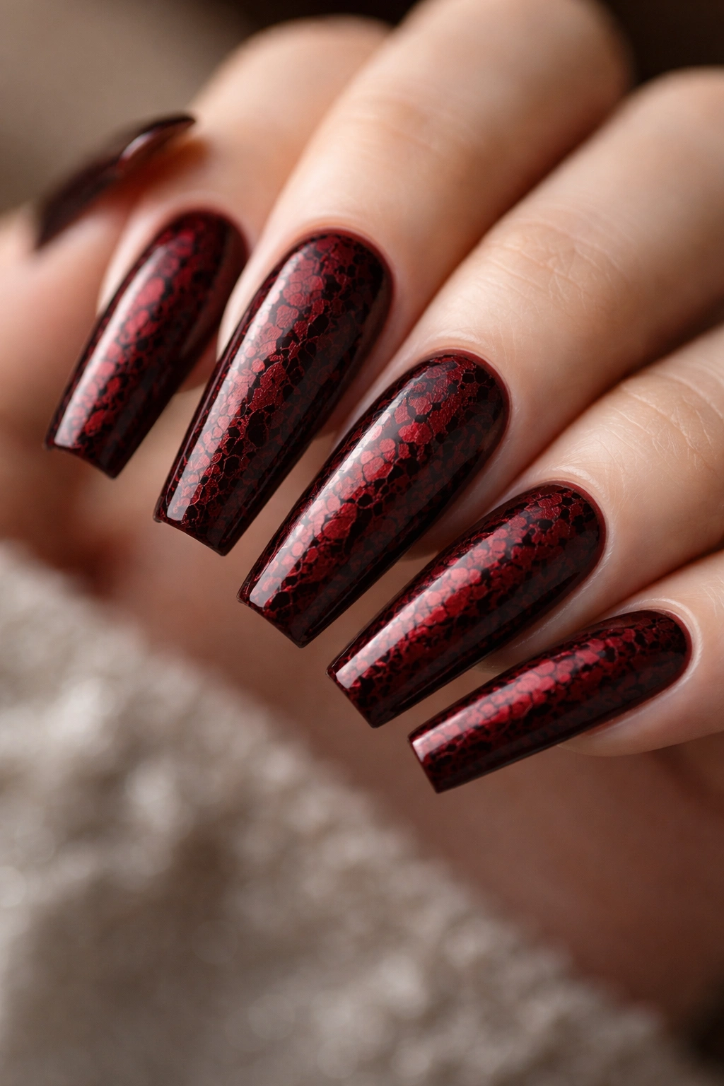 Dark red coffin nails with crackle texture.