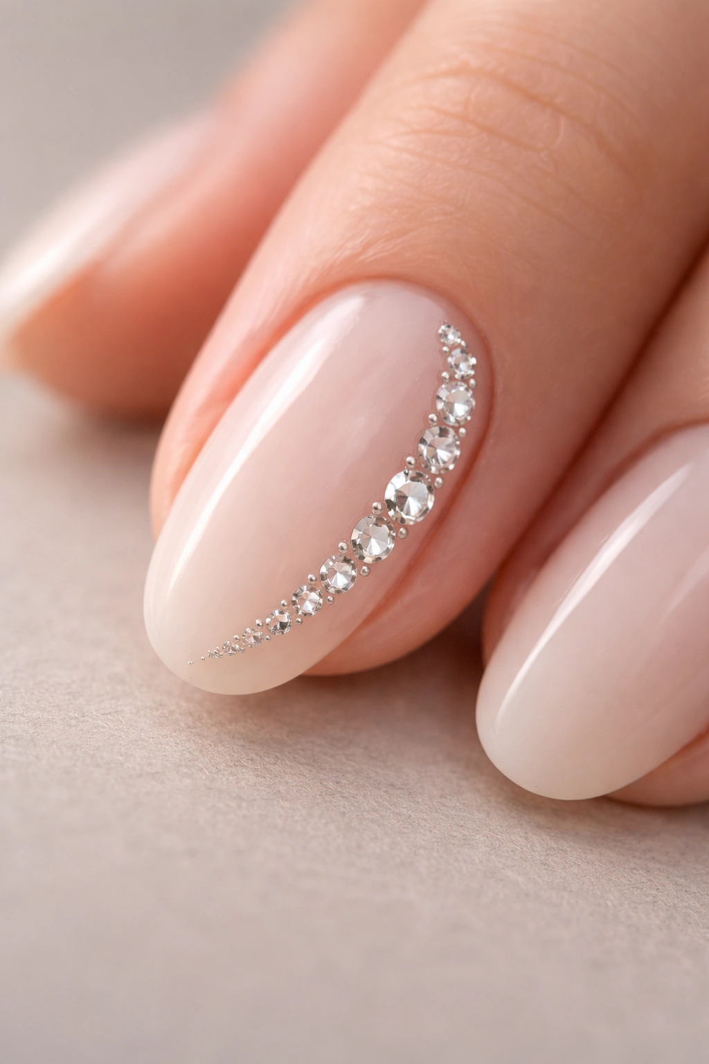 Short oval nail with a curved trail of crystals
