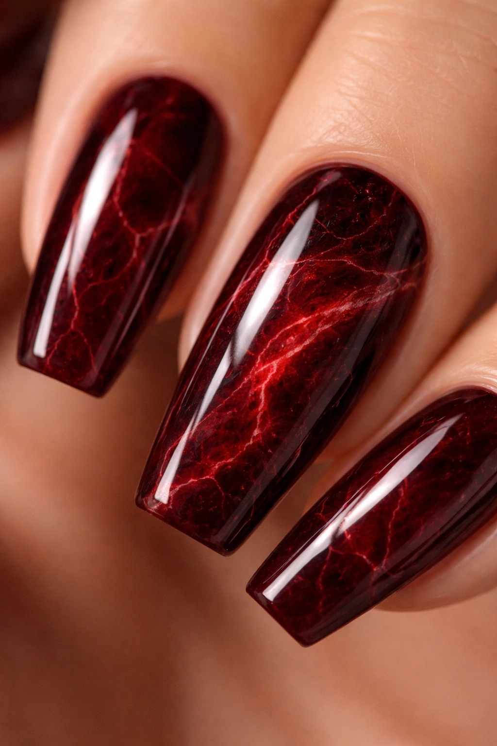 Dark red marble coffin nail with glossy finish