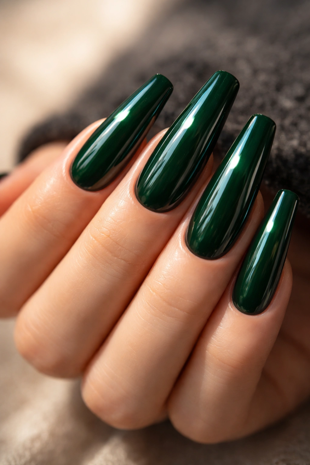 Deep emerald glossy ballerina nails with high-shine finish