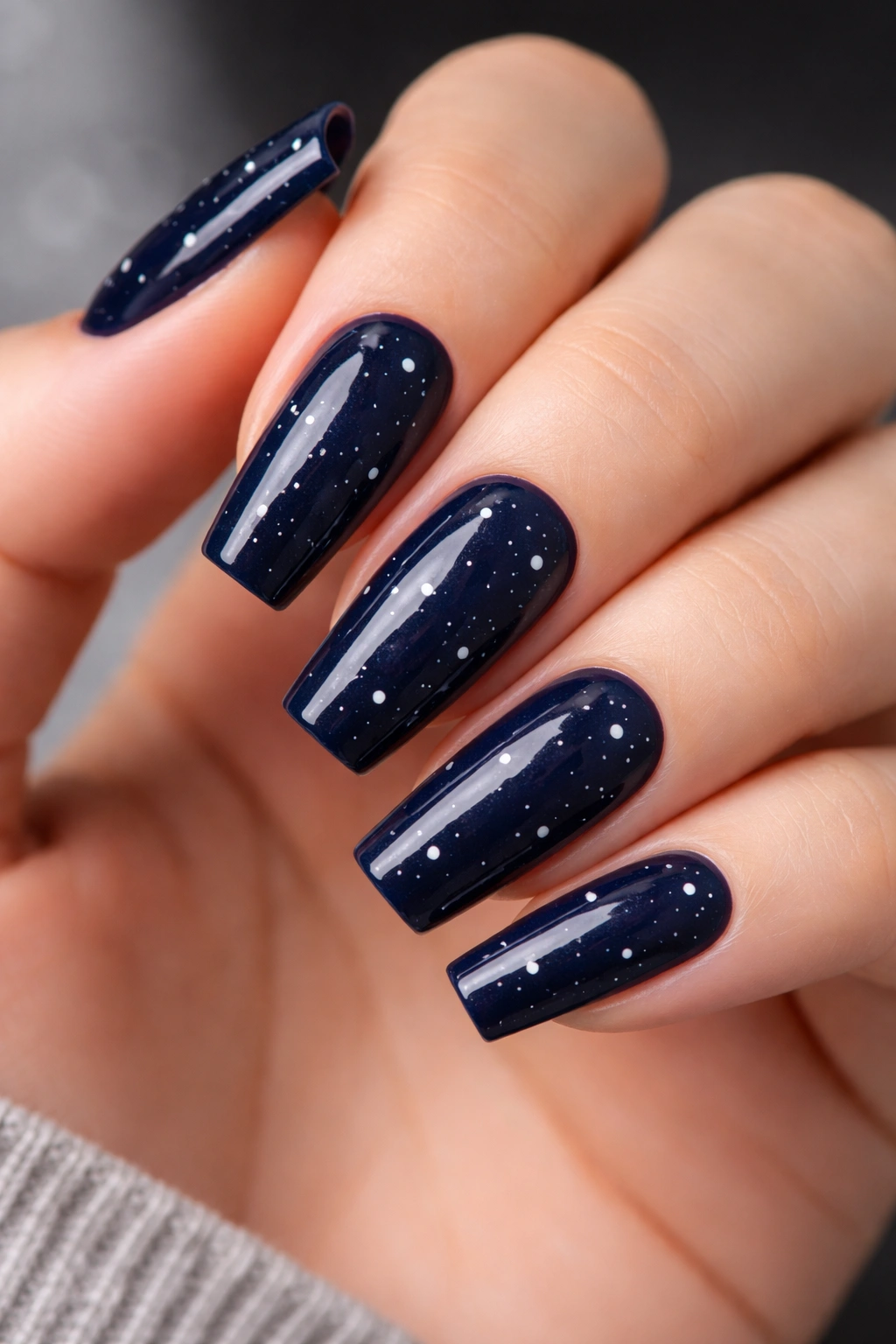 Deep navy coffin nails with scattered white stars
