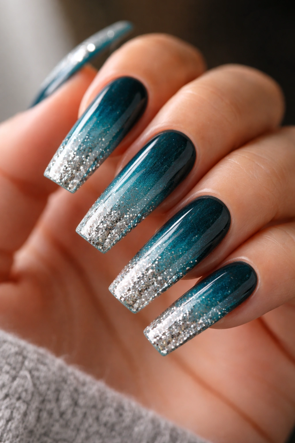 Coffin nails teal ombre fading to silver glitter tips