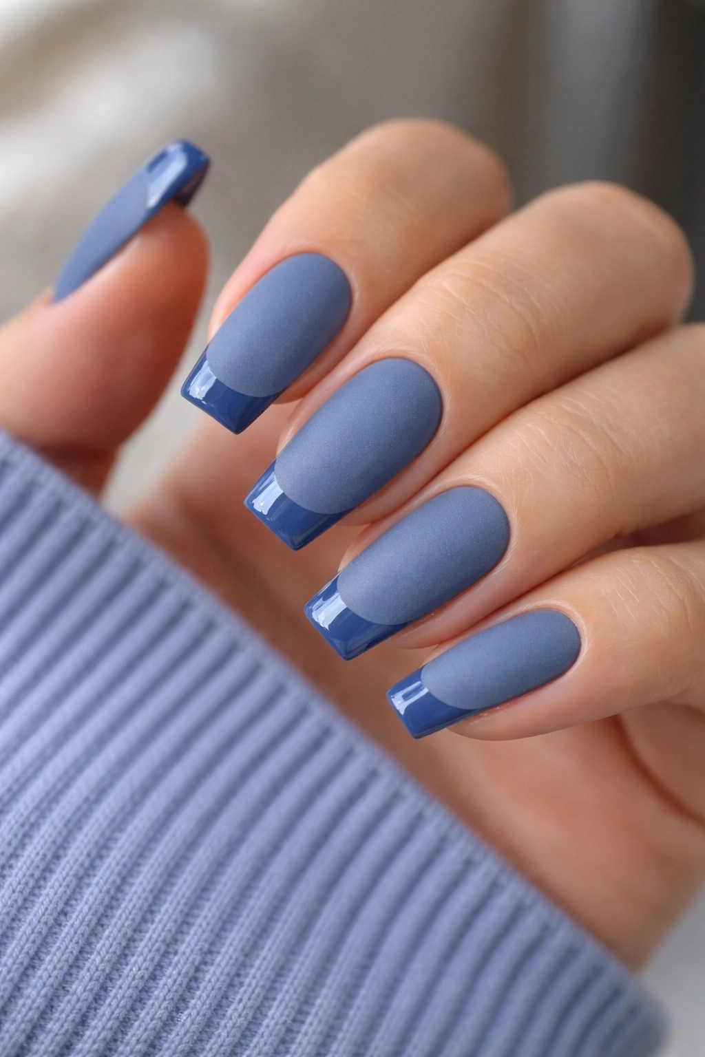 Denim blue matte nails with glossy tips on a ballerina-shaped manicure.