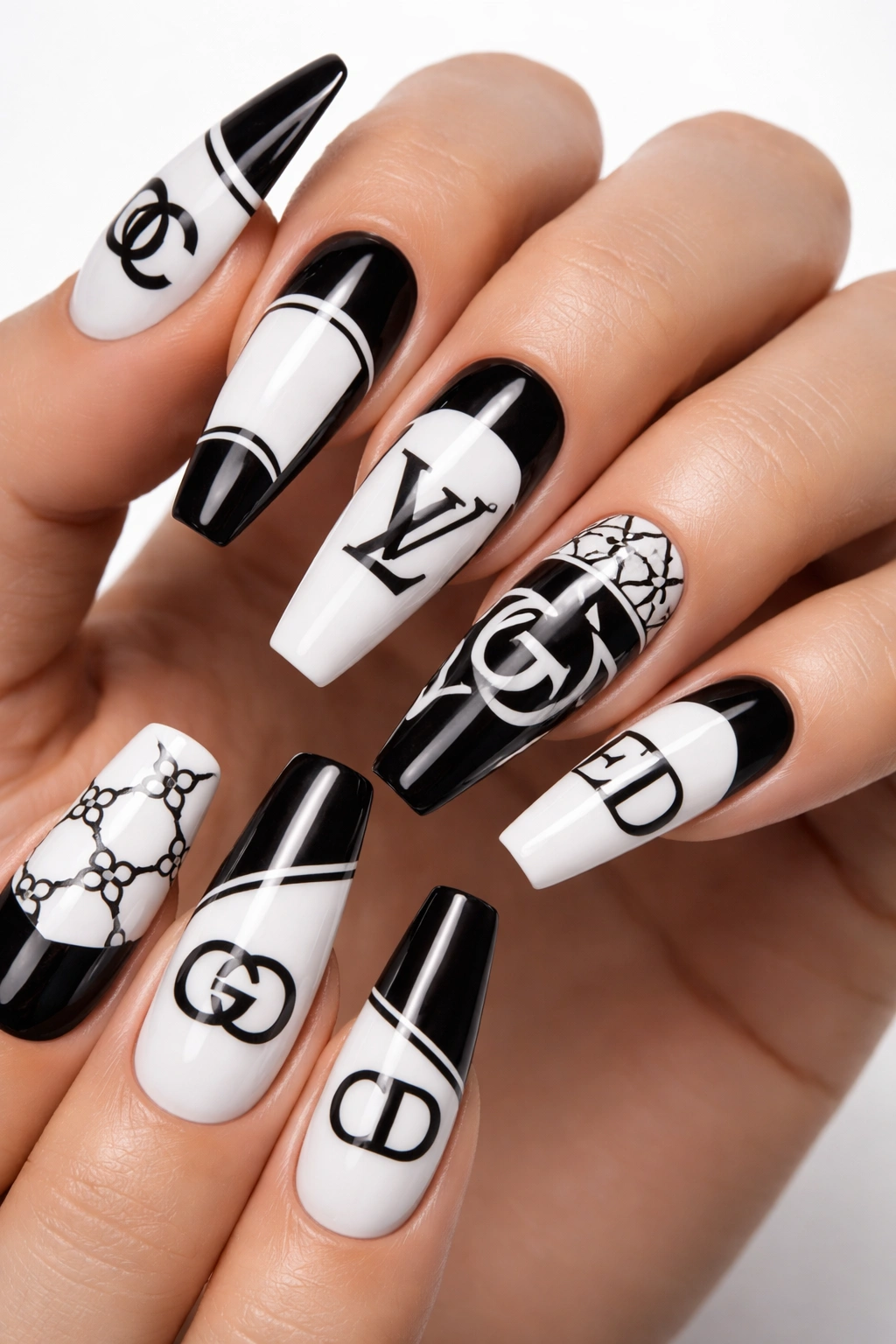 Close-up of nails with abstract designer-inspired line art patterns